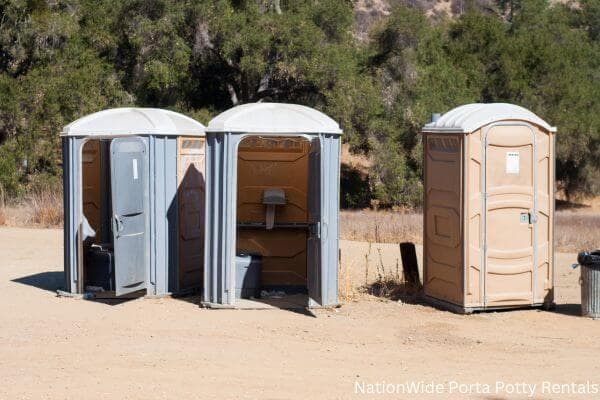 a clean row of portable restrooms for outdoor weddings or festivals in Aberdeen, ID